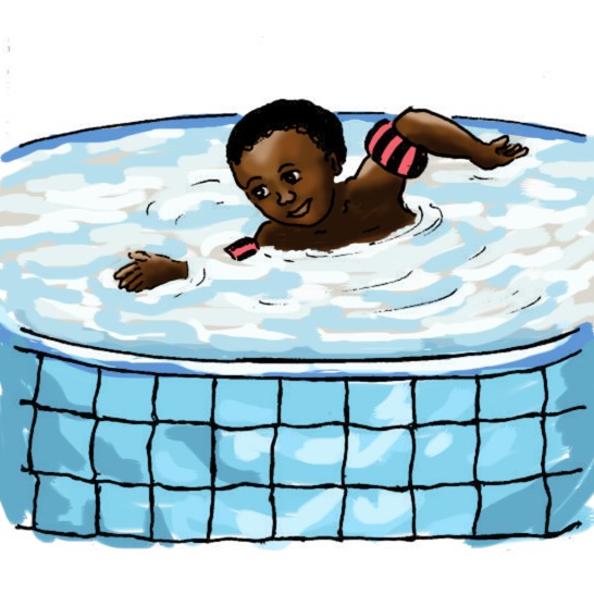 A boy swimming in a paddling pool.