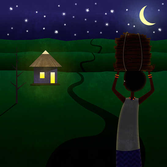 A girl carrying wood on her head at night time and looking at a lit-up hut.